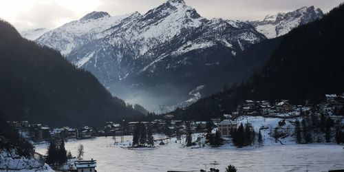 Scenic view of snowcapped mountains against sky