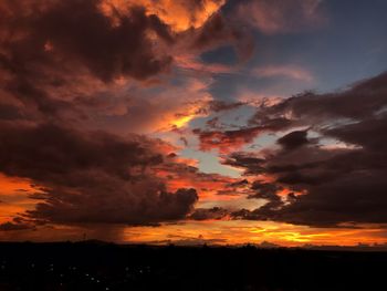 Scenic view of dramatic sky during sunset