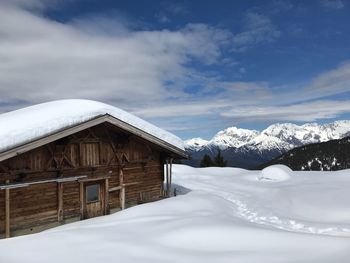 Snow covered mountains against sky