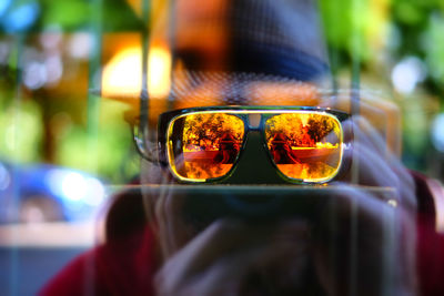 Close-up of wine glasses on sunglasses