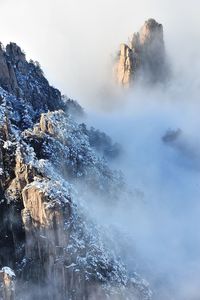 Scenic view of snow covered mountain