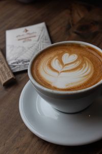 Close-up of cappuccino on table