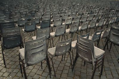 Empty chairs in row