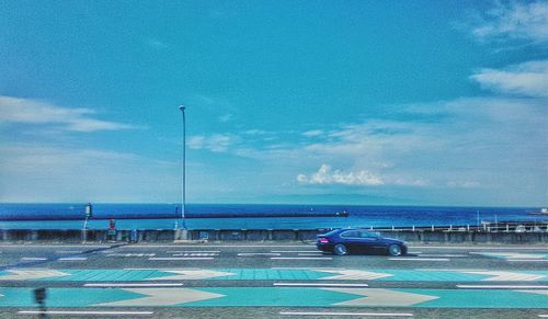 Scenic view of sea against clear blue sky