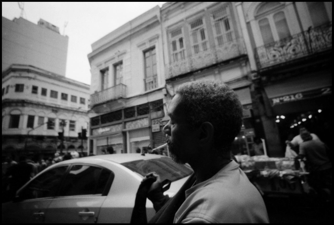 MAN ON STREET AGAINST CITY