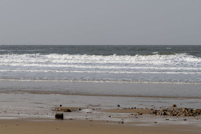Scenic view of sea against clear sky