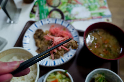 Close-up of hand holding food