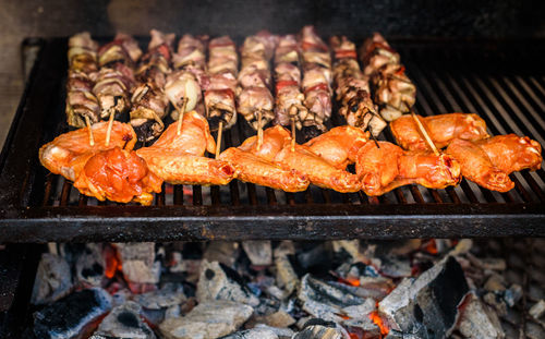 Close-up of meat on barbecue grill