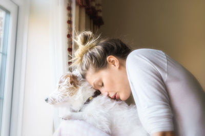 Young woman with cat