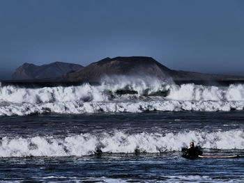 Scenic view of sea against clear sky