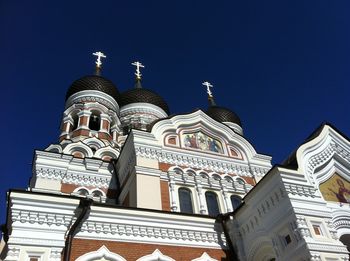 Low angle view of alexander nevsky cathedral against blue sky