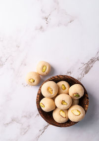 Traditional indian sweets burfi on marble background