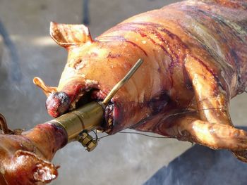 Close-up of meat on barbecue grill