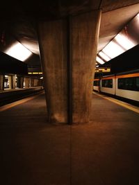 View of railroad station platform at night