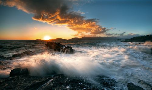 Scenic view of sea against sky during sunset