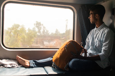 Man sitting in train
