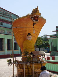 Low angle view of statue against clear sky