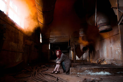 Man working in abandoned building