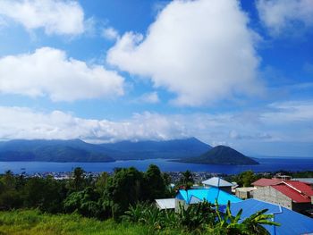 Scenic view of swimming pool by sea against sky