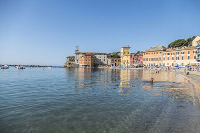 View of buildings against clear sky