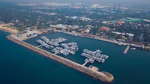 High angle view of cityscape by sea