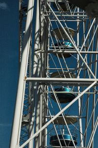 Low angle view of bridge against blue sky