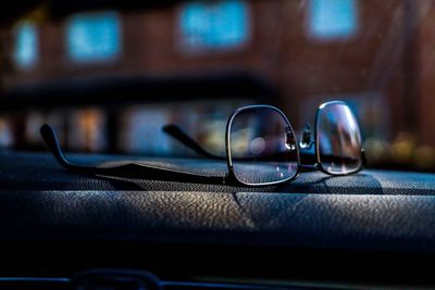 Close-up of eyeglasses in car