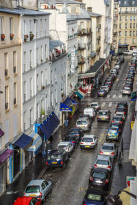 High angle view of vehicles on road in city