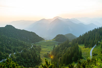 Scenic view of mountains against sky during sunset