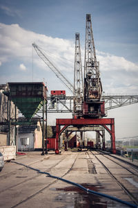 View of cranes in harbor