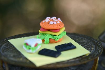 Close-up of a miniature burger on table