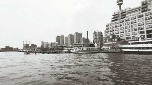 Buildings in city against sky