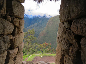 View from the window of the ancient city of machu picchu and its ruins
