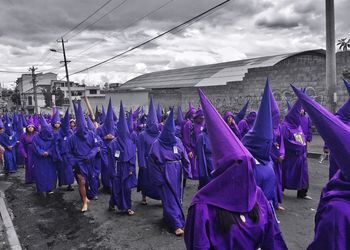 Panoramic view of people hanging against sky