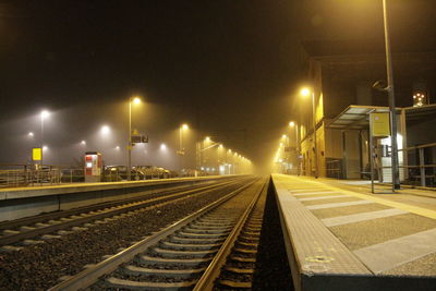 Railroad tracks at night