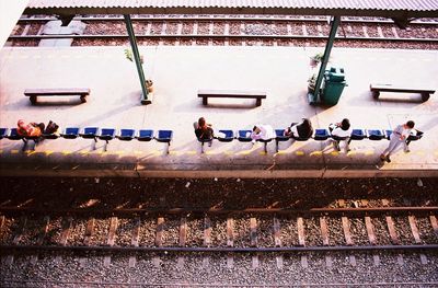 Group of people at railroad station platform