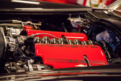 Close-up of red vintage car in garage