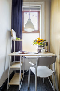 Empty chairs and table at home