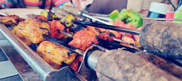 Close-up of food on barbecue grill