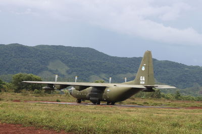 View of landscape with mountains in background