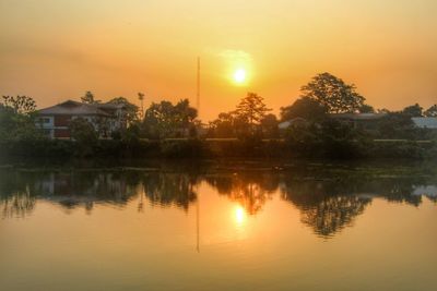 Scenic view of lake at sunset