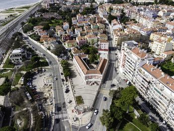 High angle view of street amidst buildings in city