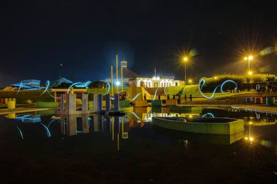 Illuminated street light at night