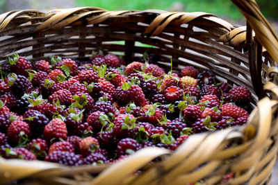 High angle view of raspberries in wicker basket