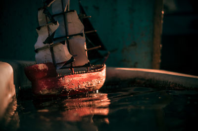 Close-up of toy boat on water