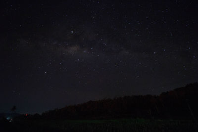 Scenic view of star field against sky at night