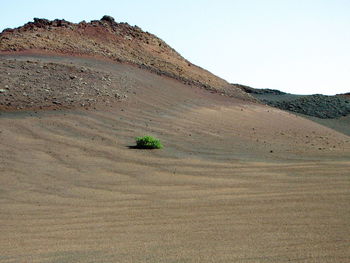 Scenic view of desert against sky