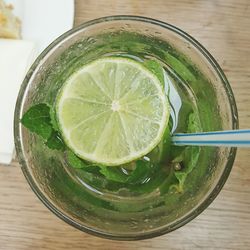 Directly above shot of drink in glass on table