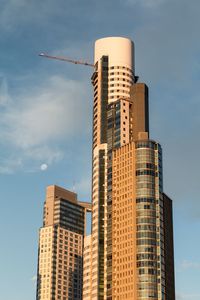 Low angle view of modern buildings against sky