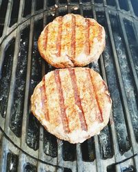 Close-up of meat on barbecue grill